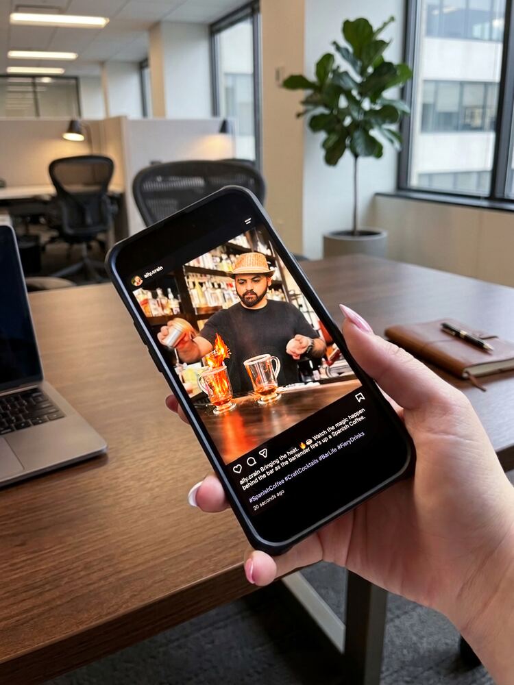 On-site project photo - social media content on phone